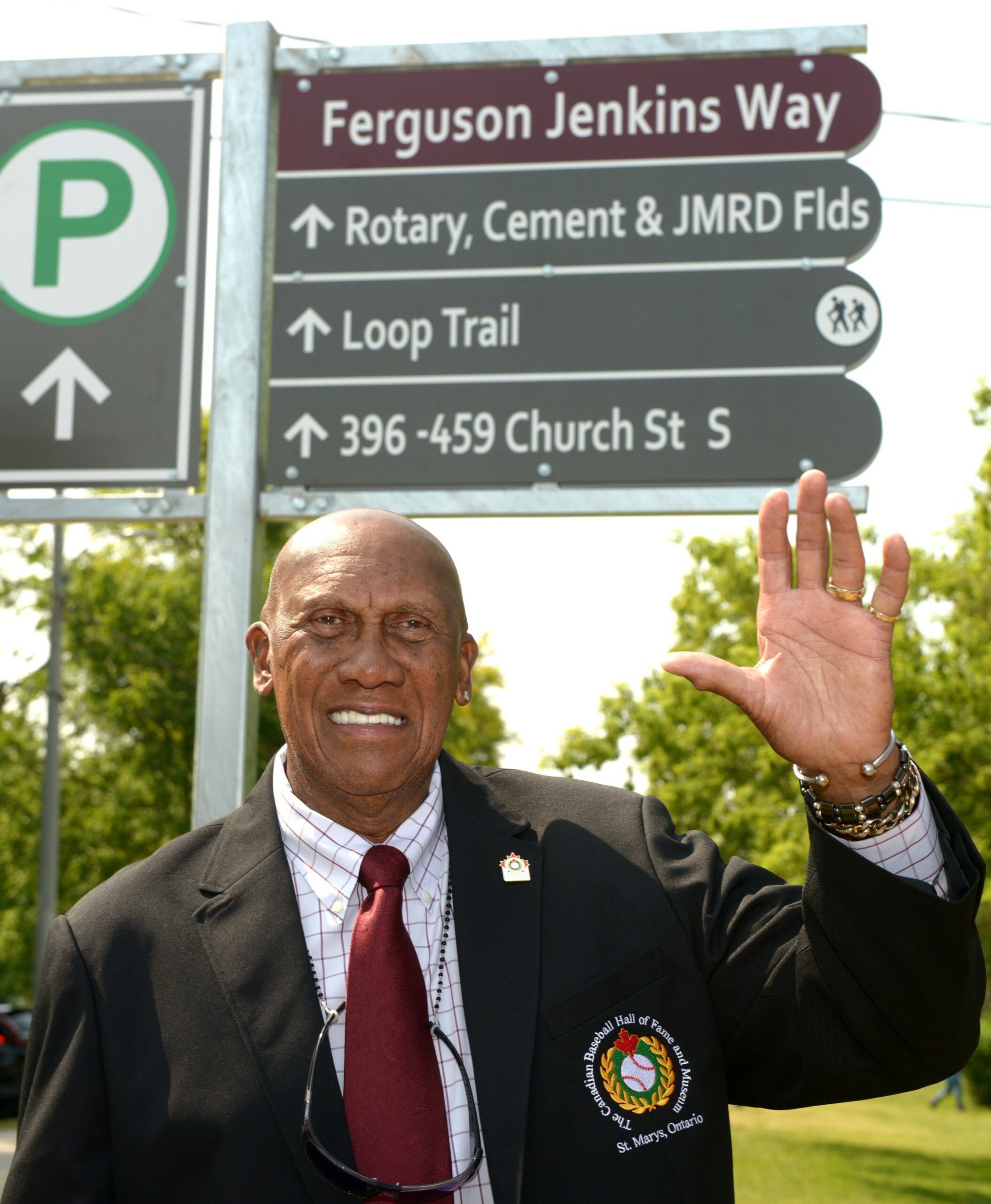 Canada's greatest baseball icon Ferguson Jenkins stands in front of a street named after him in front of the Canadian Baseball Hall of Fame and Museum in St. Marys, Ontario (photo courtesy of the museum).